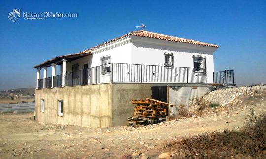 Vivienda condstruida en madera con acabado en sate