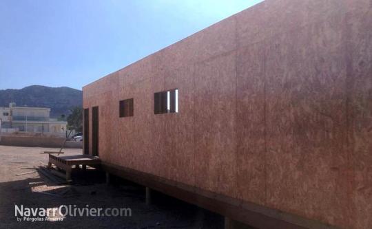 Construcción sobre pilotes de madera de chiringuito fijo de 150 m2 en Cartagena