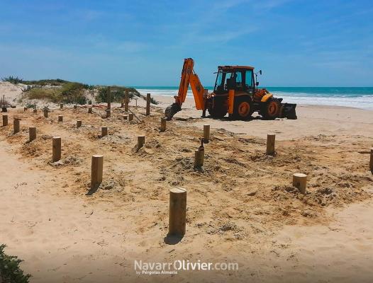 Instalación de pilotes de madera en Chiclana de la Frontera. Cádiz