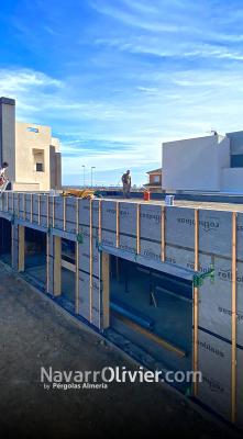 Casa de madera con fachada ventilada