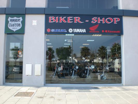 Arquitecto Sevilla: Tienda de motos