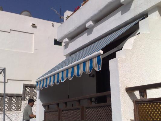 Toldo Mod. Titanus Manual