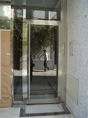 Puerta de entrada en acero inoxidable