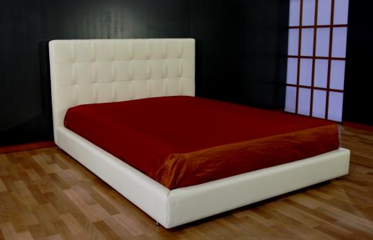 Cama tapizada a medida