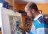 Rubén de Luis pintando un cuadro