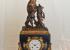 Reloj con figura de bronce Moinel