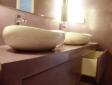 Reforma de Baño en Buhardilla con microcemento. Arquitectos Decoración Madrid