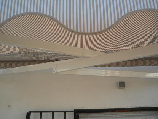 toldo articulado tecnocruce