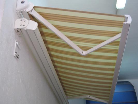 toldo articulado con cofre