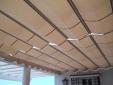 toldo plano entre pared