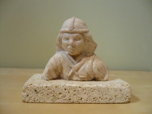 cabeza guerrero pisapapeles