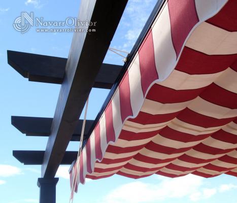 Pergola de madera porta toldo