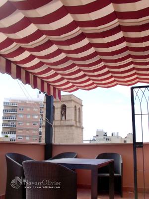 Pergola con toldo para atico