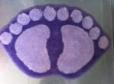 Alfombra pies morado