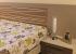 Dormitorio lacado con luz