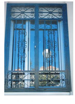 reja de ventana con cerradura