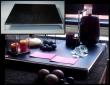 mesa  altura 16 cm en madera negra y patas acero.1 MTR X 1 MTR.OFERTA  85 EUR
