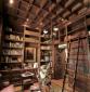 Biblioteca forrada en madera. Ebanisteria Arenas