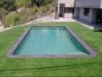 Piscina en jardin con coronación porcelanica Piscina en jardin con coronación porcelanica