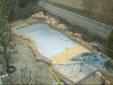 Construcción piscina entorno rocas Construcción piscina entorno rocas