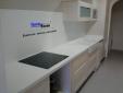 Encimera cocina en Compacto Blanco.