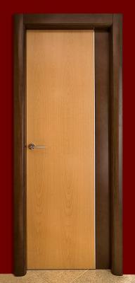 Puertas Dominguez®: Puerta en haya tintada nogal con perfil de aluminio vertical