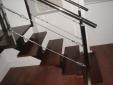 Escalera de inox con peldaños de madera