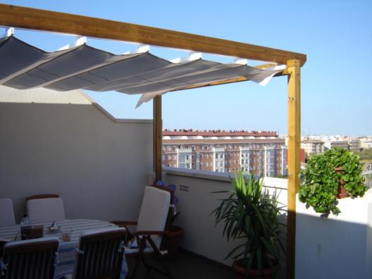 pergola con toldo pliegues