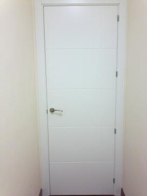 Puerta de paso fresado