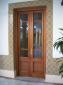 Puertas Salcedo.Puerta de madera maciza barnizado teñida