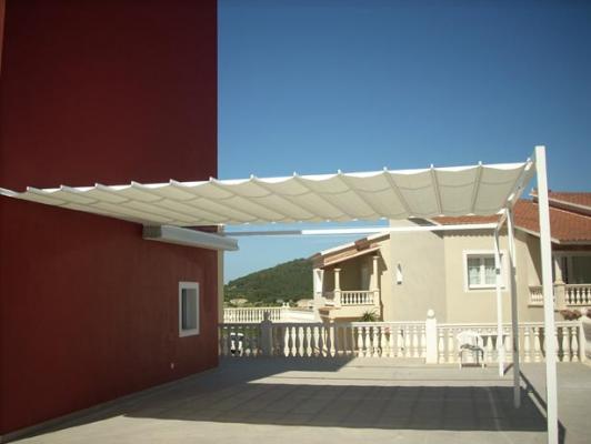 Toldo corredero para patio