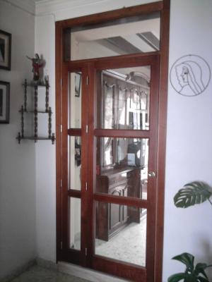 Puerta doble en madera de Pino (adaptada a hueco)