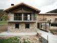 CASA NUEVA CON FACHADAS DE PIEDRA