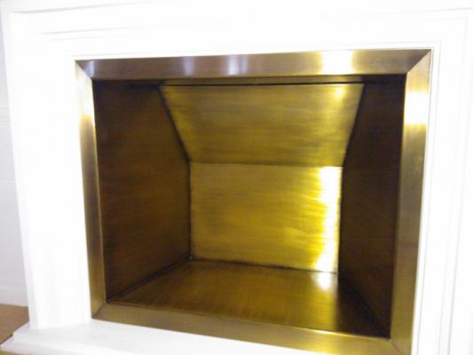 Cajón chimenea latón