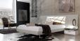 Dormitorio moderno con curvas.