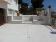 renovacion y reconstruccion de escalera y suelo en patio trasero