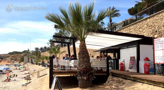 Chiringuito de madera para temporada con pergola adosada